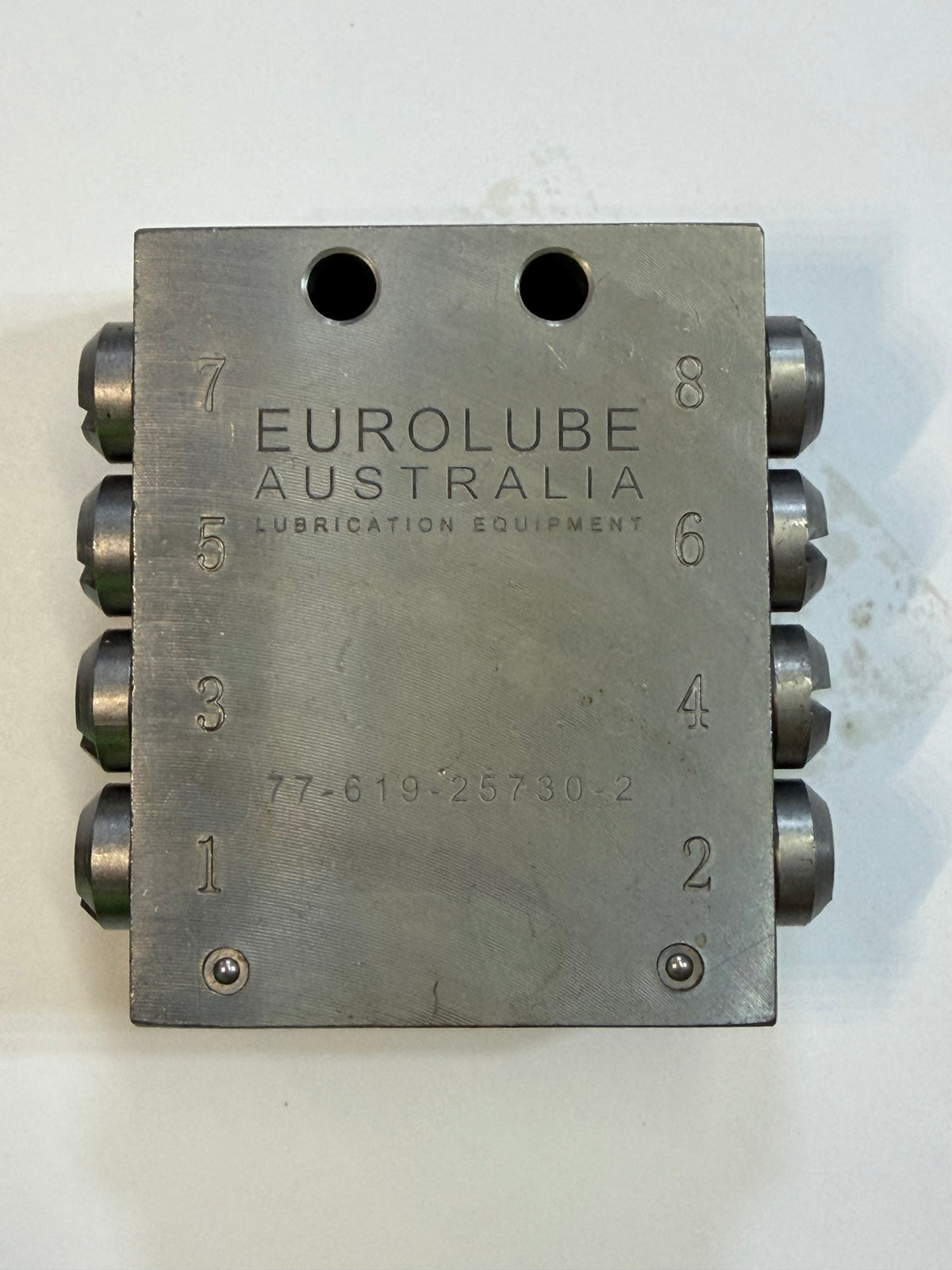 77 619-25730-2 8 Port Metering Device, Divider Valve Block