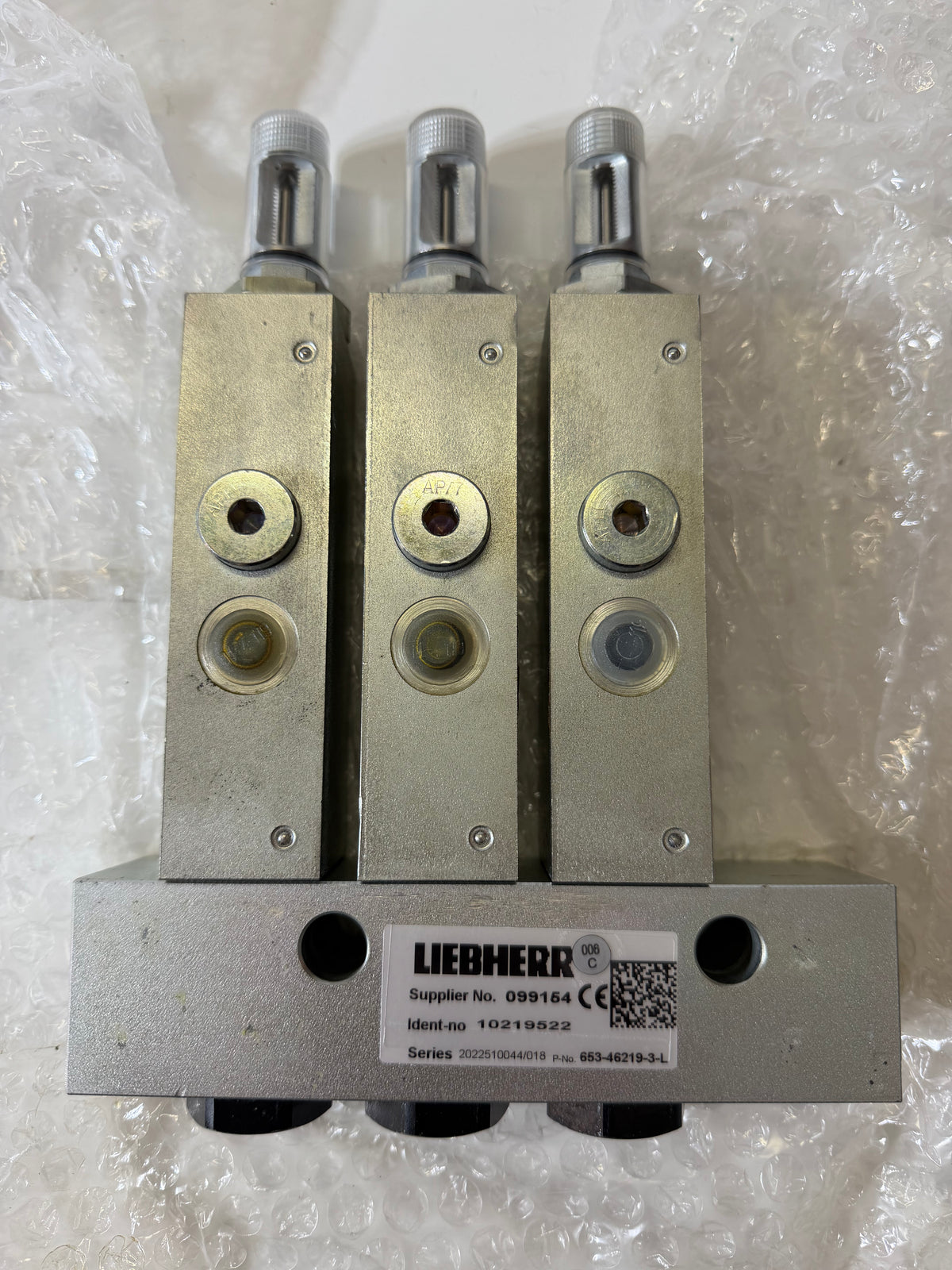 Liebherr 10219522 Distribution Plate + Grease Injector, 653-46219-3-L