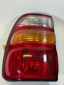 Toyota 81551-60560 Genuine LH Light Assembly (used) for 100/105 Series