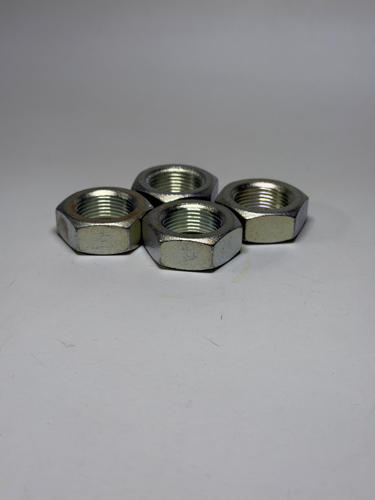 Isuzu 0911115220 Union Nuts — Bag of 4