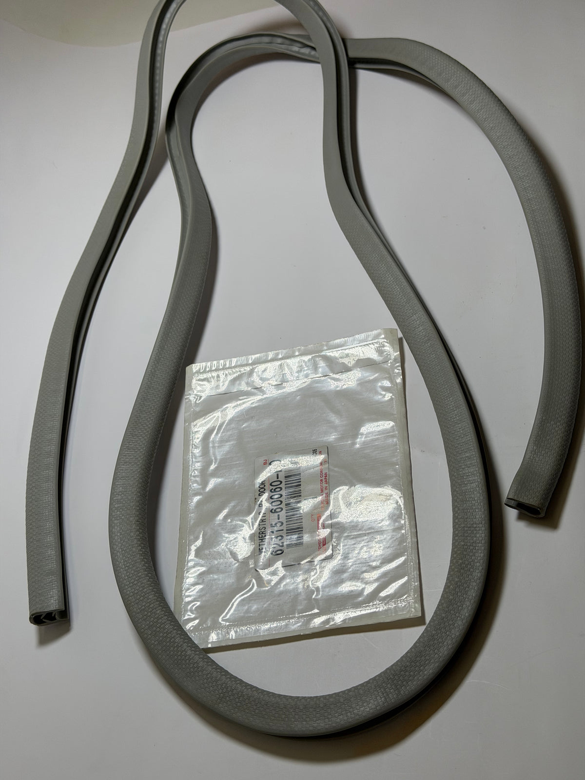Toyota 62315-60060-B0 Weatherstrip RF, Front Door Trim, Light Grey