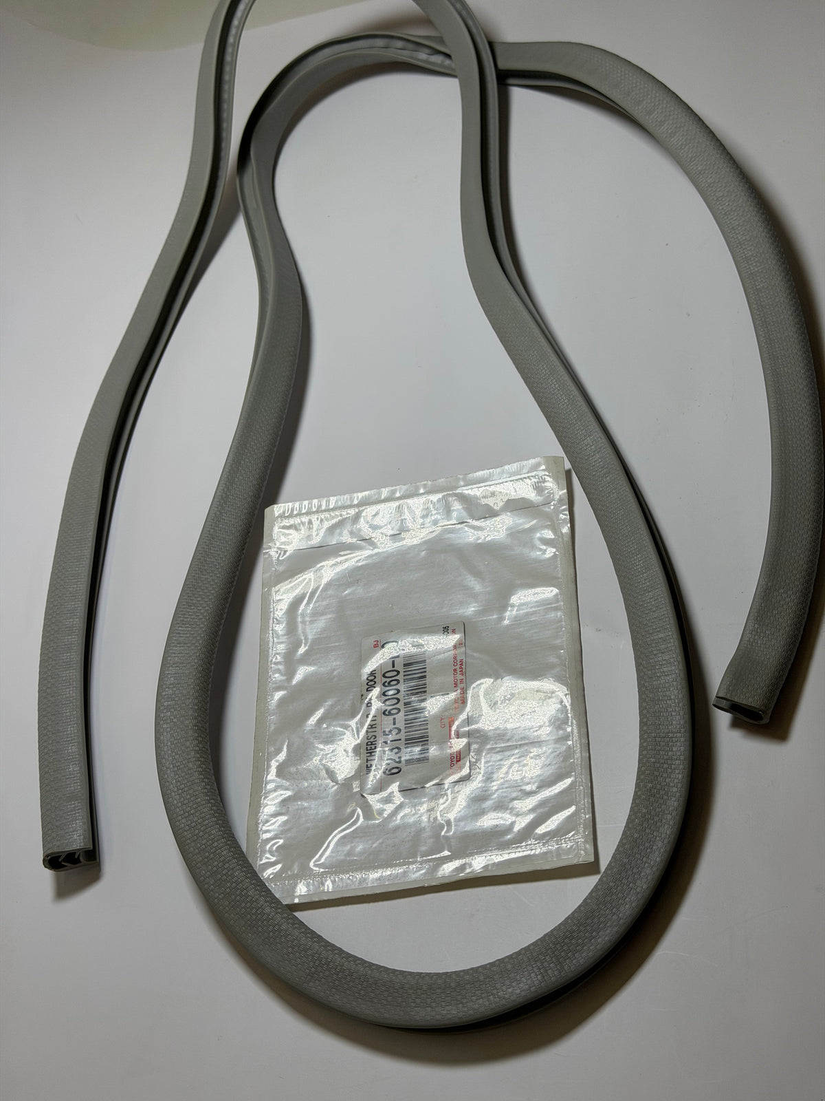 Toyota 62315-60060-B0 Weatherstrip RF, Front Door Trim, Light Grey